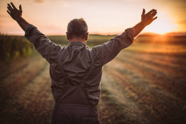 istock Farmer in field . Freedom 1014933952