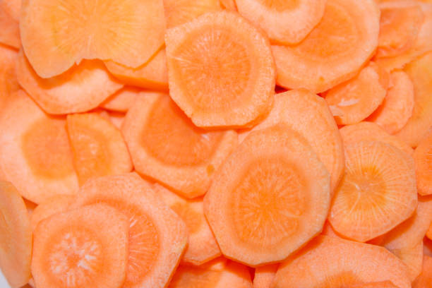 istock Cut into rings vegetable the carrot is on the Board 1014934020
