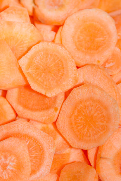 istock Cut into rings vegetable the carrot is on the Board 1014934048