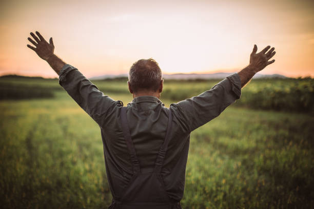 istock Farmer in field . Freedom 1014939402