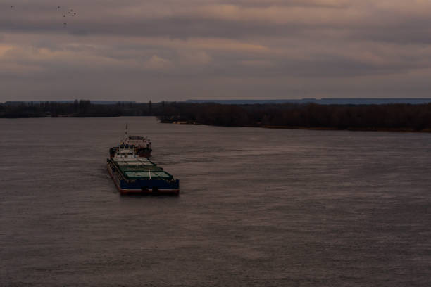 istock Big barge and ship on river Dnieper 1014943360