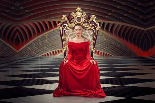 A woman in a luxurious gown dress sitting on a queen's throne
