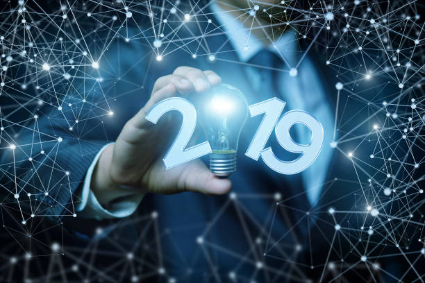 istock Businessman shows the inscription in 2019. 1014950230