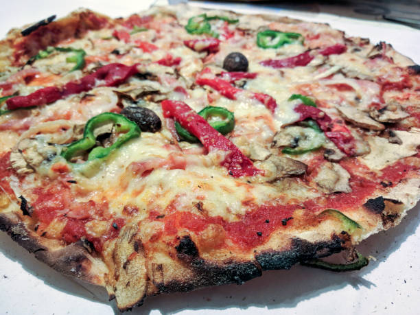 istock Traditional Italian pizza with vegetables 1014957394