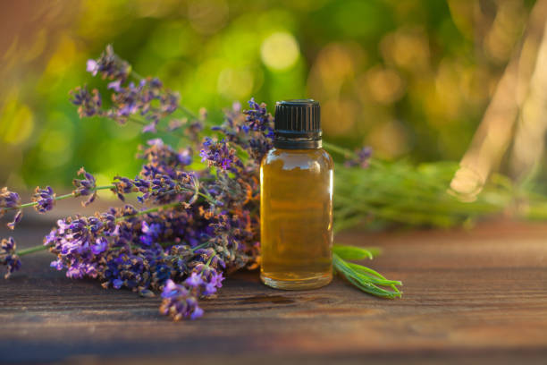 istock lavender essential oil in  beautiful bottle on table 1014968938