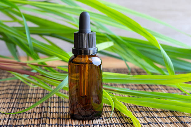 istock A bottle of lemon grass essential oil with fresh lemon grass 1014974596