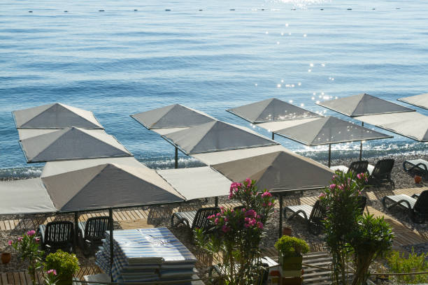 istock Beach umbrellas with sunbeds  in Kemer 1014974786