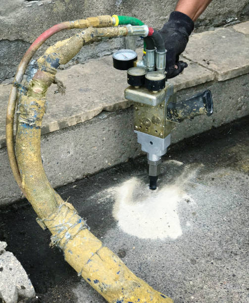 istock Mudjacking Foam Injection Repair for Concrete Cement Sidewalk 1014987844