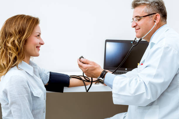 istock Offering his expert advice to his patient 1014998132