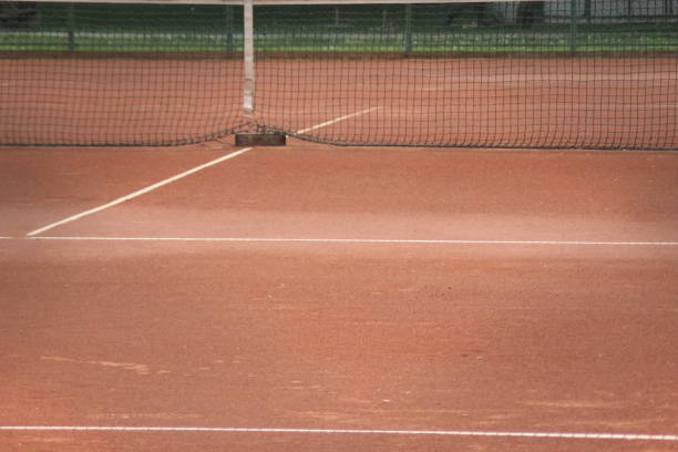 istock Tennis court with nets and posts 1014998406