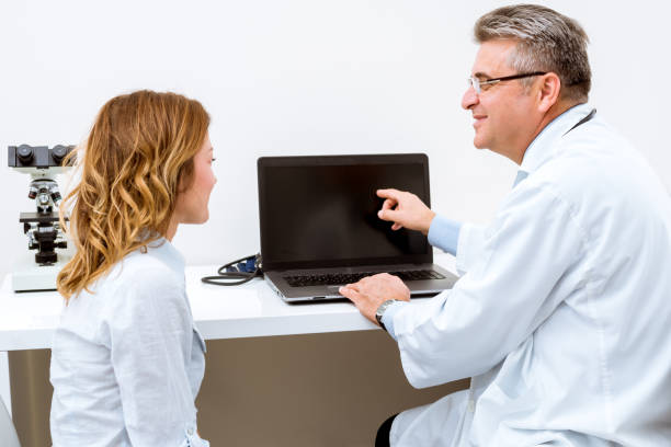 istock Offering his expert advice to his patient 1014998496