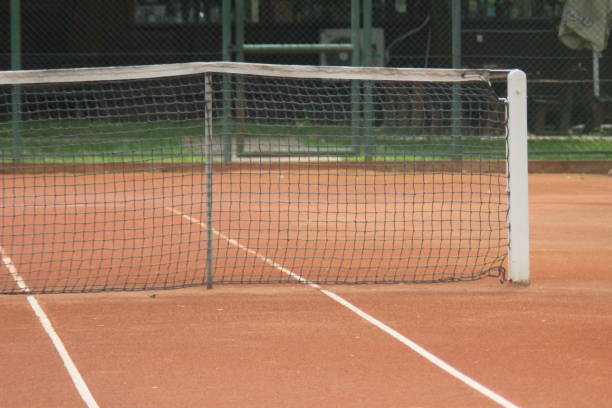 istock Tennis court with nets and posts 1014998548