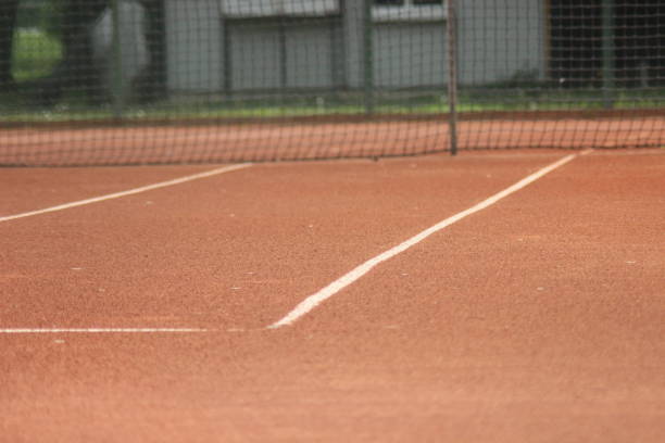 Tennis court with nets and posts