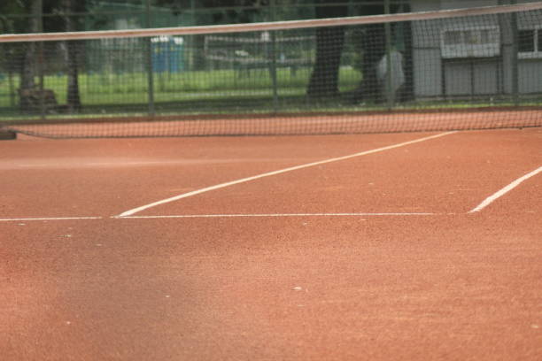 istock Tennis court with nets and posts 1014998694