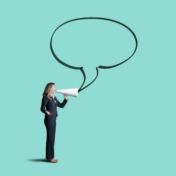 istock Businesswoman Using Megaphone To Talk Into Speech Bubble 1015001542