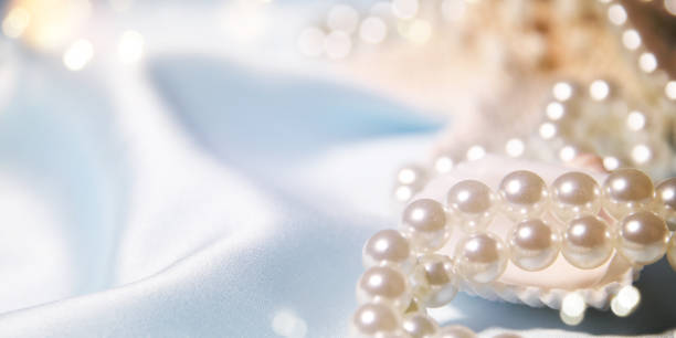 istock Wedding background with pearls and sea shell. Luxury wedding background 1015004646