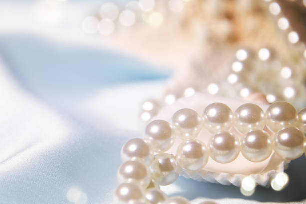 istock Wedding background with pearls and sea shell. Luxury wedding background 1015008276