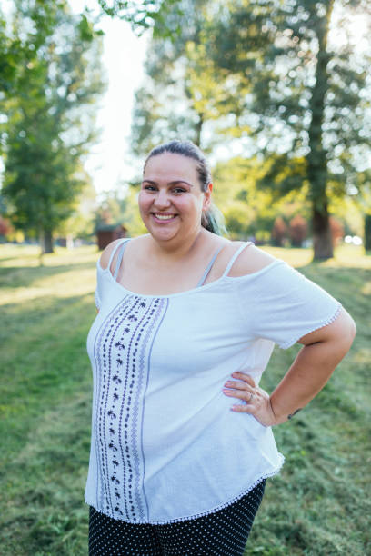 istock Beautiful overweight young woman posing 1015033622