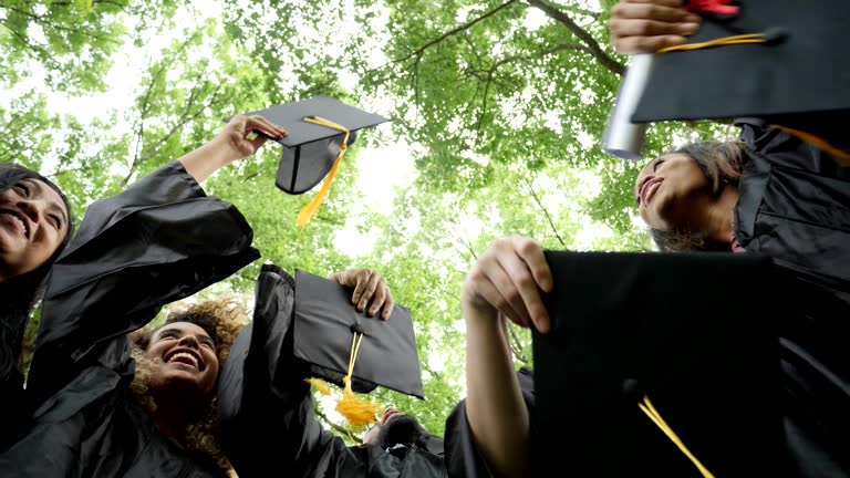 Excited college graduates