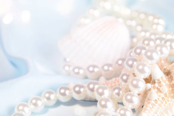 istock Wedding background with pearls and sea shell. Luxury wedding background 1015038866