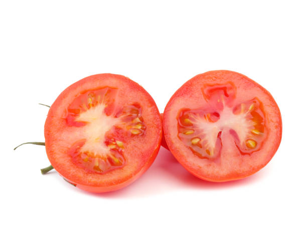 istock Ripe delicious tomatoes are lying on the white background, 1015055056