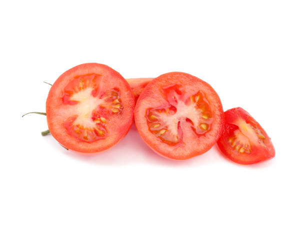 istock Ripe delicious tomatoes are lying on the white background, 1015055076