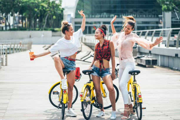 istock Women with bicycles having fun 1015058116