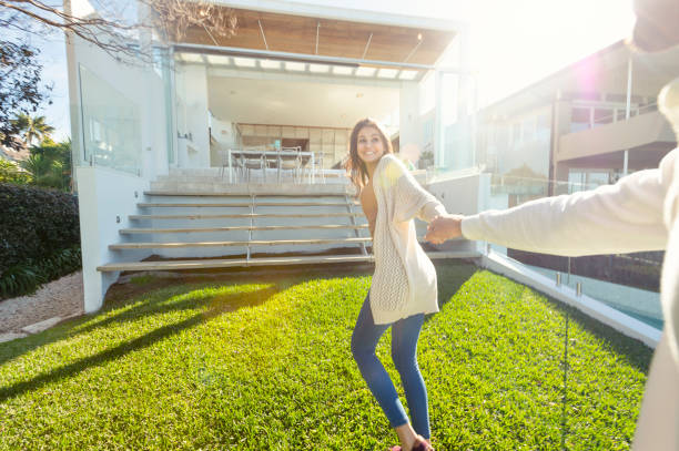 istock Excited couple running into their new home. 1015065228