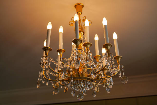 istock Decorative Crystal Chandelier Suspended Close To The Ceiling 1015077522