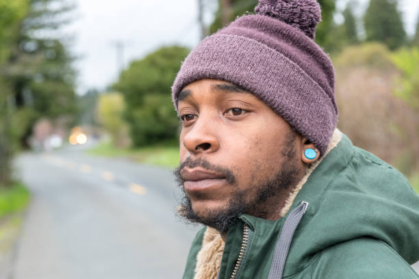 istock African descent man looking away 1015085310