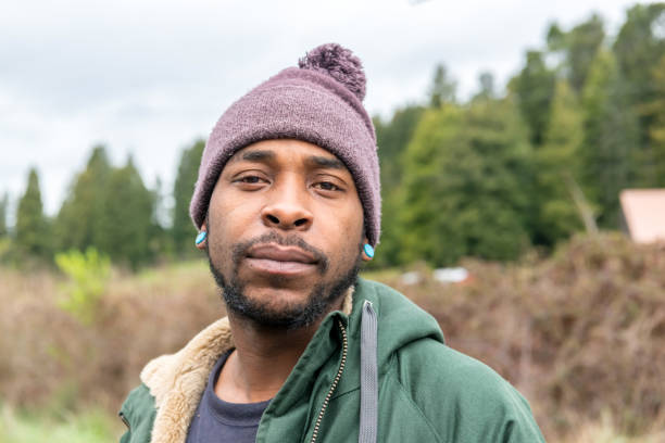 istock African descent man looking at the camera 1015090024