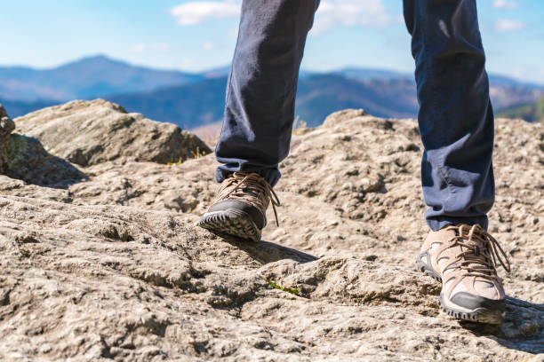 istock Man at the edge of a cliff 1015119754