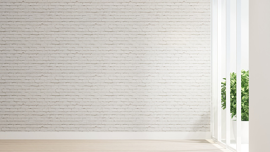 Empty room and white brick wall decorate design for artwork. Wood floor and white brick wall space for add message or decoration artwork. Interior simple design. 3D Rendering