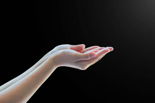 istock Pray for support concept with Isolated female empty open hand with palm raised upward 1015120546