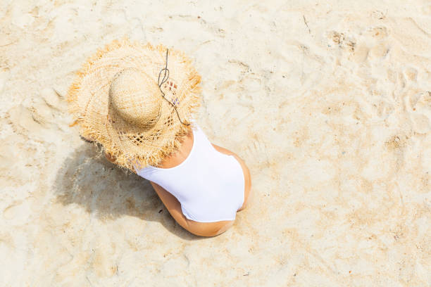 istock Woman at tropical beach 1015125062