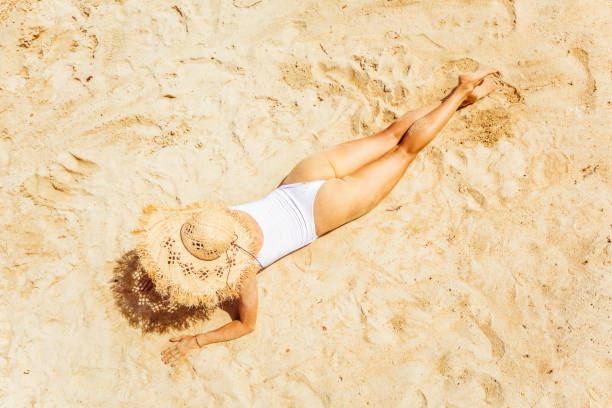 istock Woman at tropical beach 1015125066
