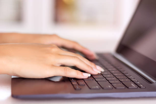 istock Young programmer female hands typing on laptop keyboard 1015137692