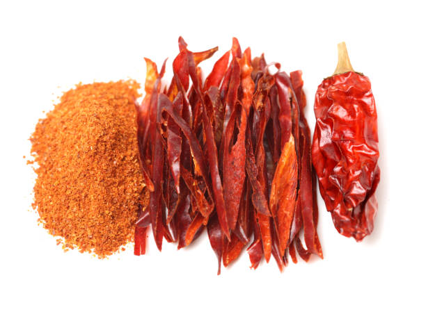 istock Dried chili and cayenne pepper on white background 1015143036