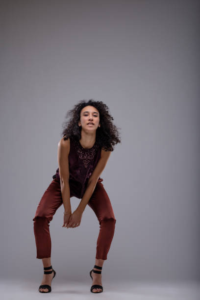 istock Sexy young woman bending forwards to camera 1015144016
