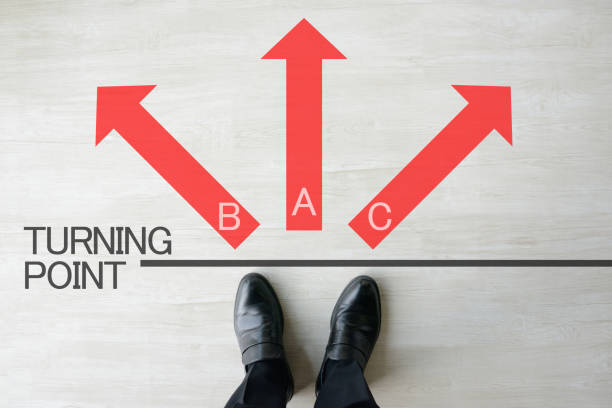 istock Business man standing on turning point 1015157398