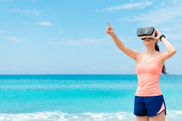 istock beautiful happy woman runner wearing VR technology 1015160262