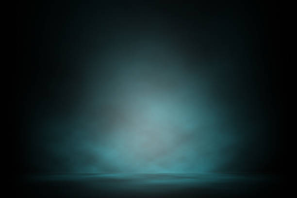 istock Blue spotlight smoke on stage night entertainment background. 1015169416