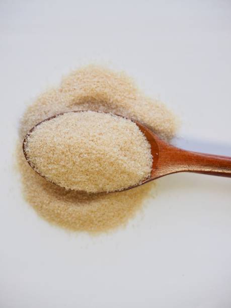 istock Brown powdered sugar in a spoon 1015172694