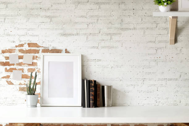 istock Mockup poster and copy space on desk. 1015180408