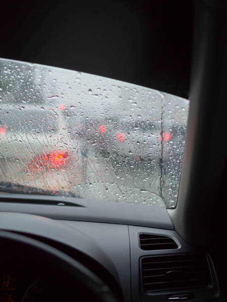 istock Traffic jam in rainy day through the car window, Vertical view 1015183024