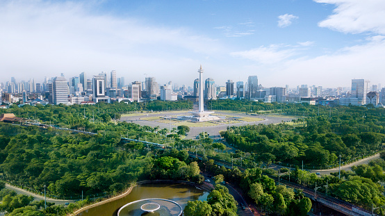 JAKARTA - Indonesia. JULY 24, 2018: Beautiful National Monument under clear sky with Jakarta cityscape in the background