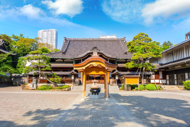 Sengakuji Temple, the site of 47 Ronin graveyard in Tokyo, Japan TOKYO, JAPAN - APRIL 20 2018: Sengakuji Temple famous for its graveyard where the "47 Ronin" are buried. The story of the 47 loyal ronin remains one of the most popular historical stories in Japan harakiri photos stock pictures, royalty-free photos & images