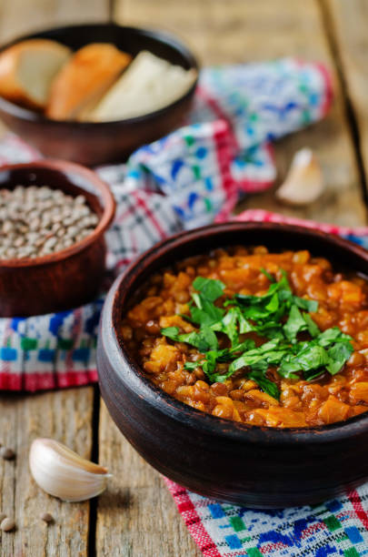 istock Cabbage Lentil stew with parsley in a bowl 1015197834