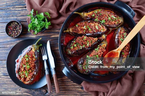 Karniyarik Stuffed Eggplants On A Plate Stock Photo - Download Image Now - Eggplant, Stuffed, Ground Beef