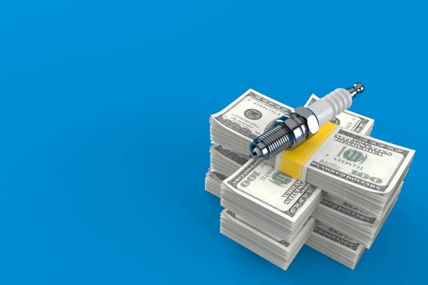 istock Car candle on stack of money 1015215528